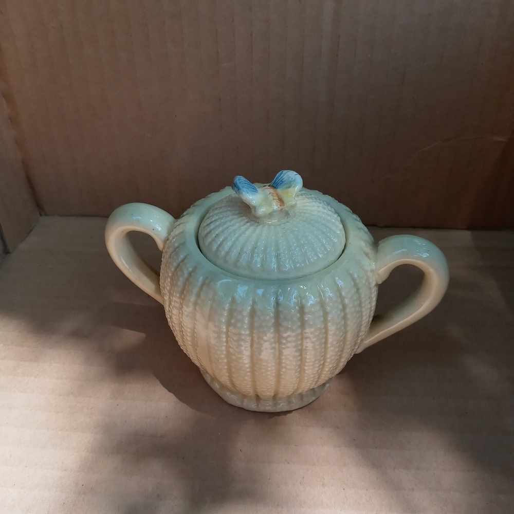 Honey pot or sugar with cover